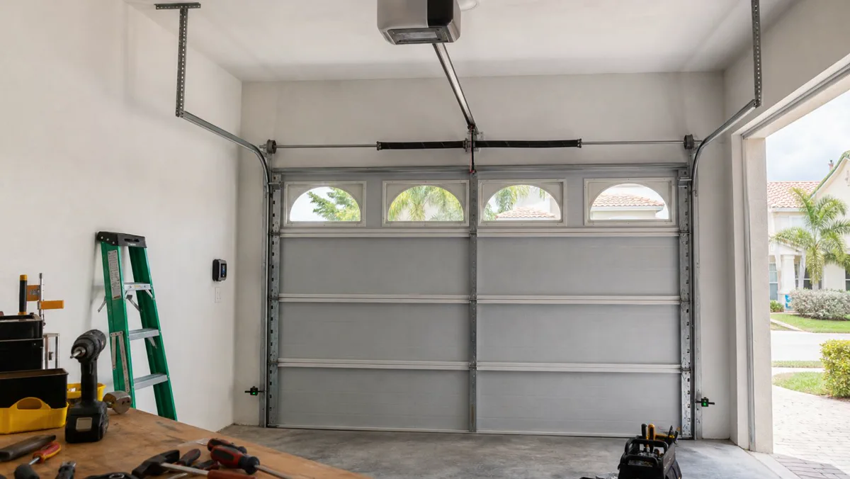 Garage door opener sensor repair check at an Orlando home